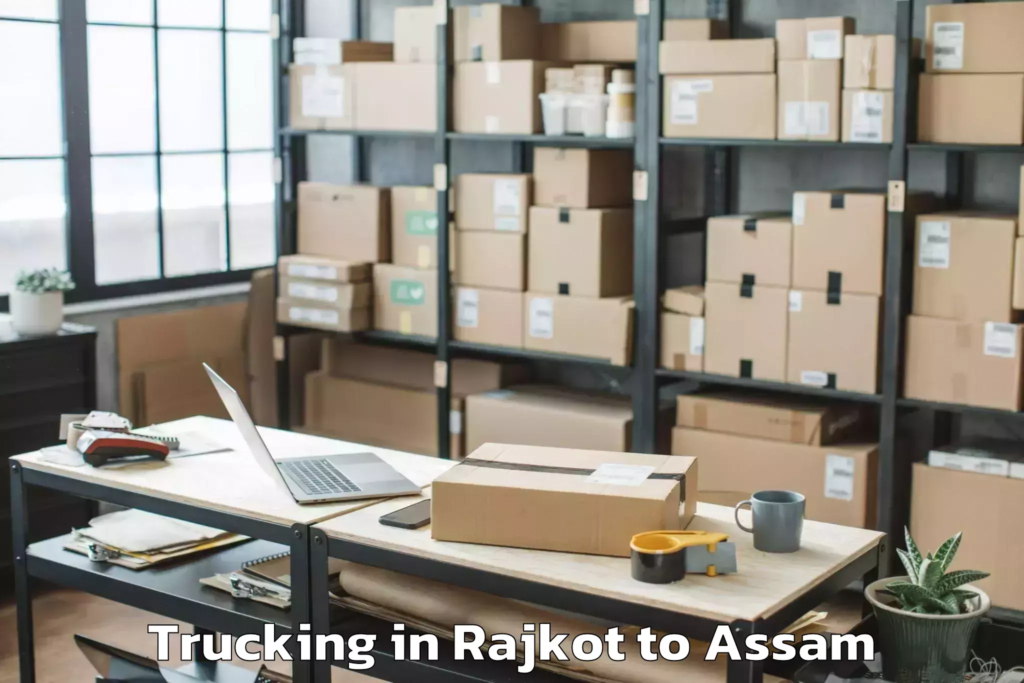 Affordable Rajkot to Karimganj Trucking